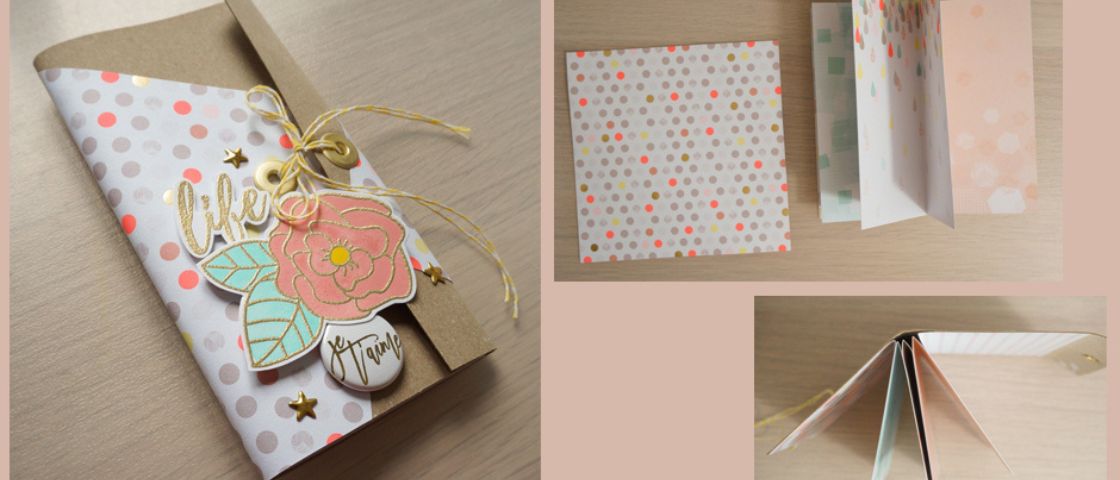 Mini-album fait main avec une couverture fleurie et un intérieur en accordéon pastel.